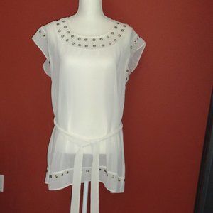 White tunic with hardware details